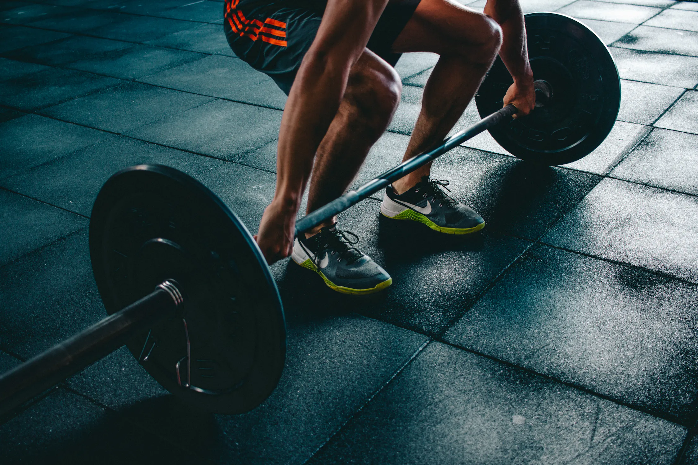 CrossFit Athlete lifting heavy barbell